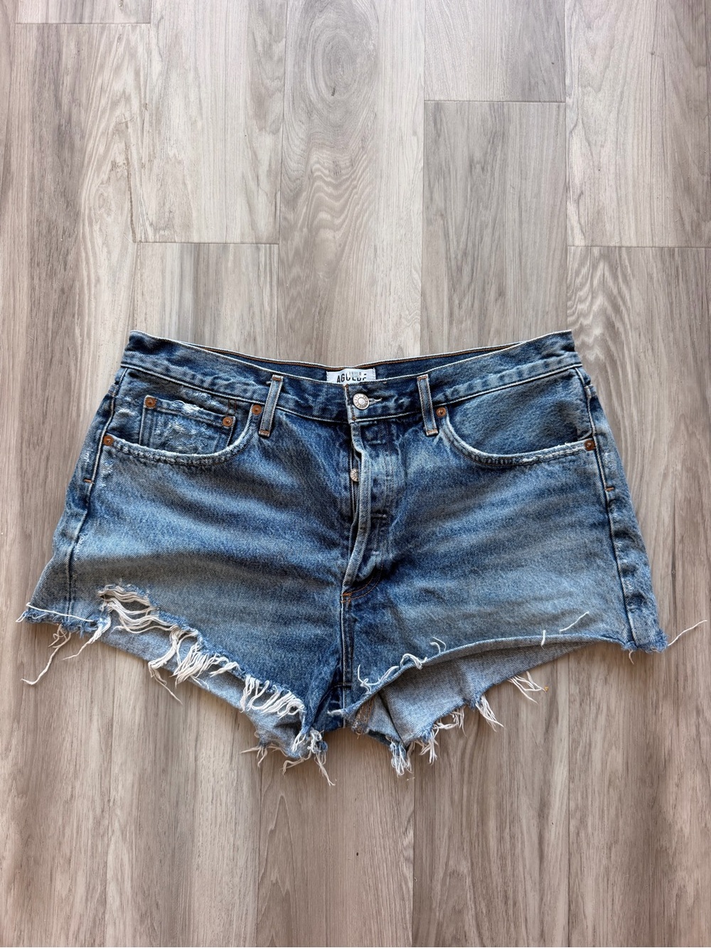 AGOLDE Medium Blue Distressed Denim Cutoffs
